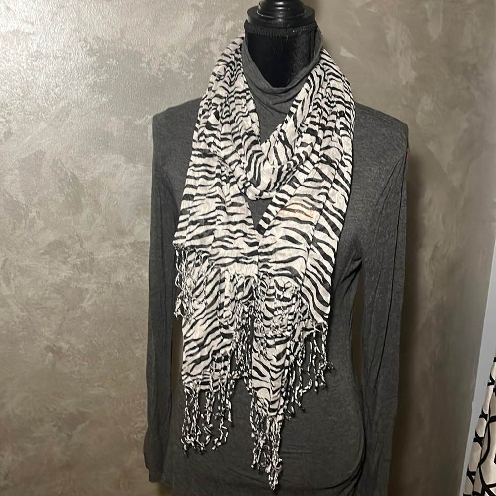Fringed zebra scarf🧣 so versatile…Wear it a million different ways! One size